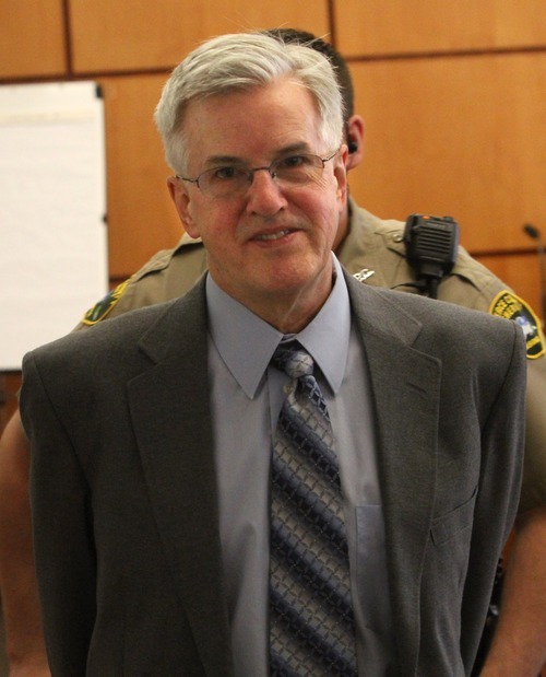 Rick Egan  | The Salt Lake Tribune 

Steve Powell smiles at his daughter Alina, as he appears in court for jury selection, in the Pierce County Superior Court, in Tacoma, Washington,  Monday, May 7, 2012.   Powell is the father-in-law of missing West Valley City woman Susan Powell.