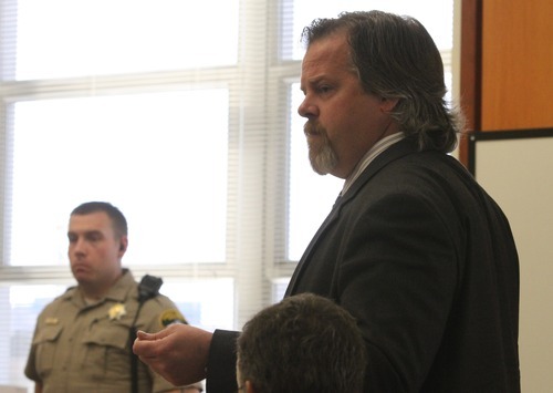 Rick Egan  | The Salt Lake Tribune 

Defense attorney for Steve Powell, Travis Currie (right) argues a series of pre-trial motions in front of Judge Ronald E. Culpepper, in Tacoma, Washington,  Monday, May 7, 2012.