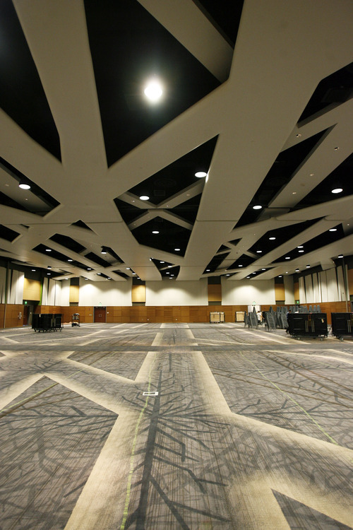 Francisco Kjolseth  |  The Salt Lake Tribune
A ballroom, nearly 17,000 square feet featuring tree limb design elements has the abilitity to divide into three rooms with air walls that maintain the wood aspects on the walls at the new Utah Valley Convention Center in Provo. The building officially opens May 12 as crews are busy putting the finishing touches on the new building on the corner of Freedom Blvd. and Center Street on Wednesday, May 9, 2012.