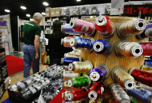 Scott Sommerdorf  |  The Salt Lake Tribune             
Quilting thread on sale at one of the booths at the Ninth annual Home Machine Quilting Show (HMQS), at the South Towne Exposition Center, Thursday, May 10, 2012.