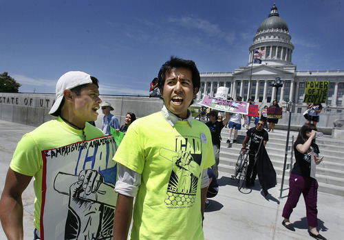 Scott Sommerdorf  |  The Salt Lake Tribune             
Dream Act supporters who are traveling across America leave the Utah Capitol on their walk to Salt Lake Community College on Thursday. They plan to travel to Provo and then Denver on Monday. The plan is to trek across America and arrive in Washington, D.C., in November.