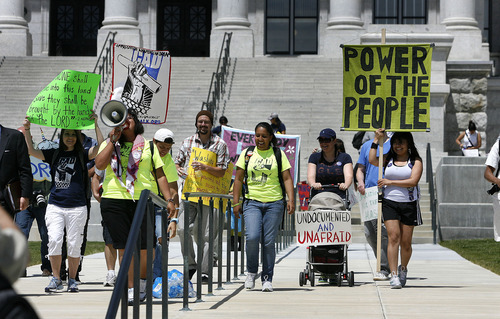 Scott Sommerdorf  |  The Salt Lake Tribune             
Dream Act supporters who are traveling across America leave the Utah Capitol on their walk to Salt Lake Community College on Thursday. They plan to travel to Provo and then Denver on Monday. The plan is to trek across America and arrive in Washington, D.C., in November.