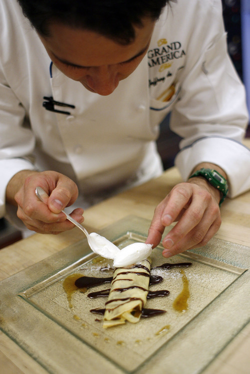 Francisco Kjolseth  |  The Salt Lake Tribune
Jeffrey de Leon, executive pastry chef at the Grand America Hotel in Salt Lake City, demonstrates how to make a crepe. Step No. 5: To serve, place desired filling down the center of each crepe and fold in sides. Garnish as desired.