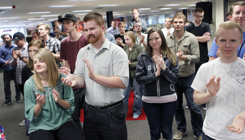 Al Hartmann  |  The Salt Lake Tribune
Employees of software company Qualtrics cheer the news Tuesday that two of the world's leading venture capital firms are making an investment in the Utah tech company.