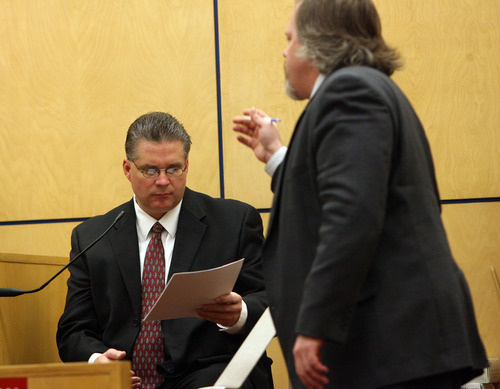 Steve Griffin | The Salt Lake Tribune


West Valley City Police officer Todd Gray looks at evidence from the witness stand, during the voyeurism trial for Steve Powell, the father-in-law of missing Utah woman Susan Powell, in Pierce County Superior Court  in Tacoma, Wash., on Monday May 14, 2012.