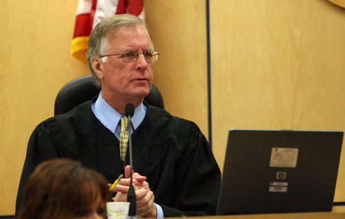 Steve Griffin | The Salt Lake Tribune


Judge Ronald E. Culpepper listens to testimony from West Valley City Police officer Todd Gray during the voyeurism trial for Steve Powell, the father-in-law of missing Utah woman Susan Powell, in  Pierce County Superior Court  in Tacoma, Wash., on Monday May 14, 2012.