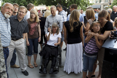 Trent Nelson  |  The Salt Lake Tribune
Members of the Farley family look on after the dedication of a plaque honoring Salt Lake City police officer Owen T. Farley, who was killed at 300 South State Street in 1951. The dedication was held Tuesday, May 15, 2012 in Salt Lake City, Utah.