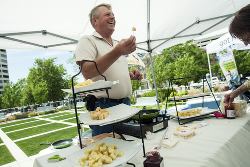 Chris Detrick  |  The Salt Lake Tribune
Grant Kohler, of Heber Valley Artisan Cheese, gives out samples of his Juustoleipa cheese during a public celebration at the Federal Building commemorating the 150th anniversary of the United States Department of Agriculture Tuesday May 15, 2012. The USDA was established May 15, 1862 by President Abraham Lincoln
