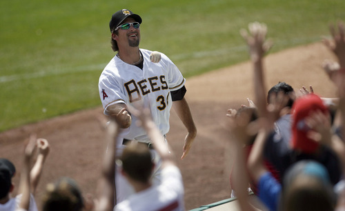Francisco Kjolseth  |  The Salt Lake Tribune
Kevin Johnson of the the Salt Lake Bees tosses a foul ball into the stands during play against the Albuquerque Isotopes on Tuesday, May 15, 2012, as baseball tries to grow the next generation of fans through things like Tuesday's annual school day game at Spring Mobile Ballpark.