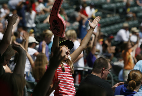 Francisco Kjolseth  |  The Salt Lake Tribune
Sydney Trimble, 11, of J.A. Taylor Elementary in Centerville gets into the spirit of singing the YMCA song during the Salt Lake Bees hosing of the Albuquerque Isotopes on Tuesday, May 15, 2012, as baseball tries to grow the next generation of fans through things like Tuesday's annual school day game at Spring Mobile Ballpark.
