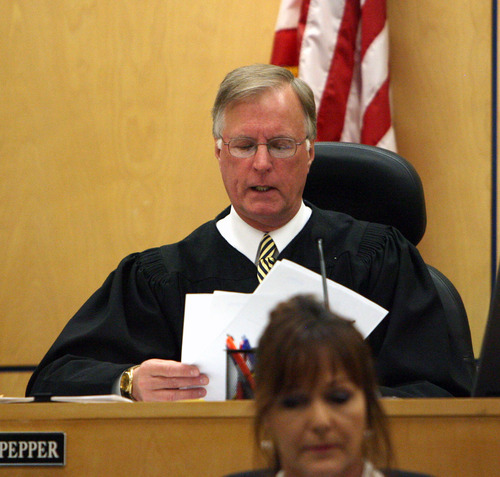 Steve Griffin/The Salt Lake Tribune


Judge Ronald E. Culpepper reads the verdict in the Steve Powell trial  in the Pierce County Superior Court in Tacoma, Washington Wednesday May 16, 2012. Powell was found guilty on 14 counts of voyeurism.