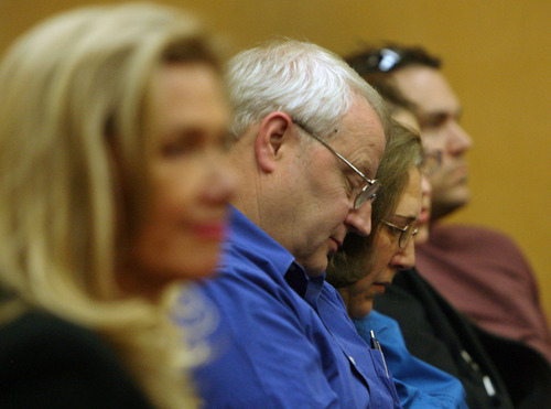 Steve Griffin/The Salt Lake Tribune


Judy Cox, center, and Chuck Cox, lower their heads as they listen as Judge Ronald E. Culpepper reads the verdict in the Steve Powell voyeurism trail in the Pierce County Superior Court in Tacoma, Washington Wednesday May 16, 2012. Powell was found guilty on 14 counts of voyeurism.