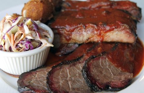 Al Hartmann  |  The Salt Lake Tribune
Soul & Bones BBQ at 2432 Washington Blvd. in Ogden is a Southern-style speakeasy that sets the tone for respectable Cajun food and barbecue, including killer jambalaya and a mouthwatering salad featuring pickled okra.