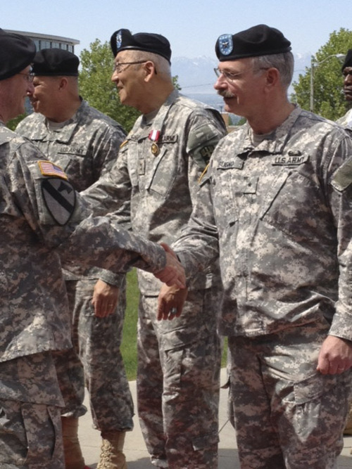 Kristen Moulton | The Salt Lake Tribune
Maj. Gen. L.P. Chang, left, and Maj. Gen. Craig A. Bugno, right, greet well-wishers after a change of command ceremony at Fort Douglas on Sunday, May 20, 2012. Bugno replaced Chang as commander of the U.S. Army Reserve's 807th Medical Command, which is based at Fort Douglas and has 11,500 soldiers in 26 states, including 500 in Utah.