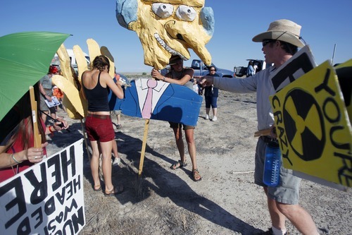 Kim Raff | The Salt Lake Tribune
Protesters gather for a parade during a rally near the proposed construction site for nuclear reactors in Green River, Utah on May 19, 2012.