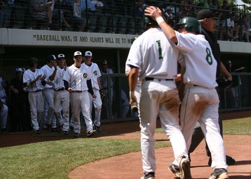 Leah Hogsten  |  The Salt Lake Tribune
 Snow Canyon's Brayden Linde and Chandler Day made two scoring runs off pitcher Austin Ovard's bat in the 5th.  Snow Canyon High School boys baseball team defeated Juan Diego during their final 3A State Championship Game 5-1 Saturday, May 19 2012 in Kearns.
