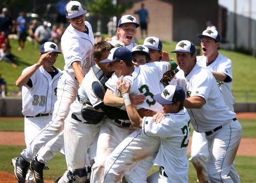 Leah Hogsten  |  The Salt Lake Tribune
 Snow Canyon's coaches and players leap out of the dugout to tackle pitcher Austin Ovard after winning the game. Snow Canyon High School boys baseball team defeated Juan Diego during their final 3A State Championship Game 5-1 Saturday, May 19 2012 in Kearns.