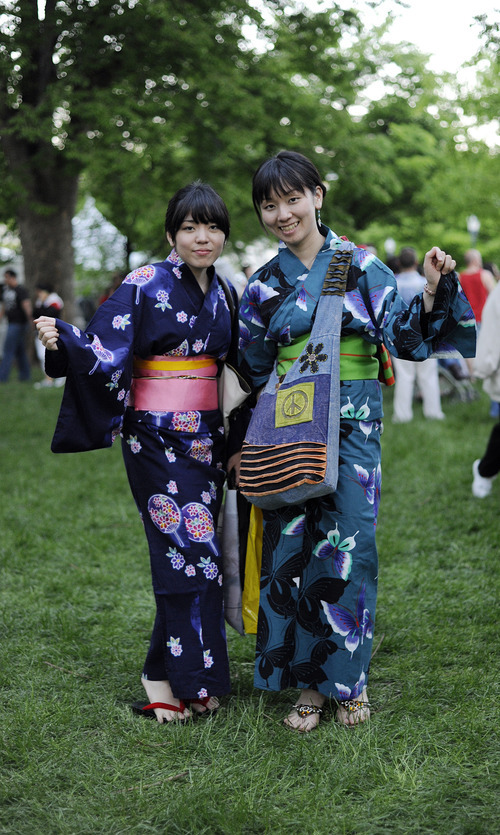 Sarah A. Miller  |  Tribune file photo
Shiho Nakaura, left, and Erika Miyamori, right, visiting from Japan, pose at the 2011 Living Traditions Festival in Salt Lake City. This year's festival runs through Sunday at the Salt Lake City & County Building.