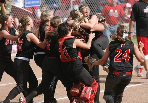 Paul Fraughton / Salt Lake Tribune
Bear River's Shaunie Owen jumps into the arms of pitcher  Jordan Theurer as the rest of the team converges on the field for the celebration of their win over Spanish Fork for the 3A championship.

 Monday, May 21, 2012