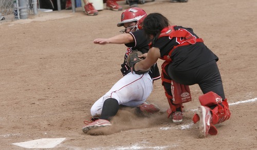 Paul Fraughton / Salt Lake Tribune
Bear River catcher Tyree Haramoto makes the tag out at the plate on a sliding Brooke Davis. Bear River went on to win the 3A state championship.

 Monday, May 21, 2012