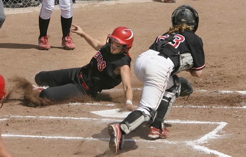 Paul Fraughton / Salt Lake Tribune
Bear River's Erin Fox touches home plate as she slides under the tag attempt by Spanish Fork catcher Dani Perkins.

 Monday, May 21, 2012