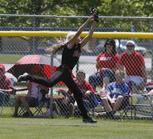 Paul Fraughton / Salt Lake Tribune
Bear River's Morgan Summers makes a leaping  catch in right field for the out. Bear River defeated Spanish Fork for the 3A state championship in softball.

 Monday, May 21, 2012