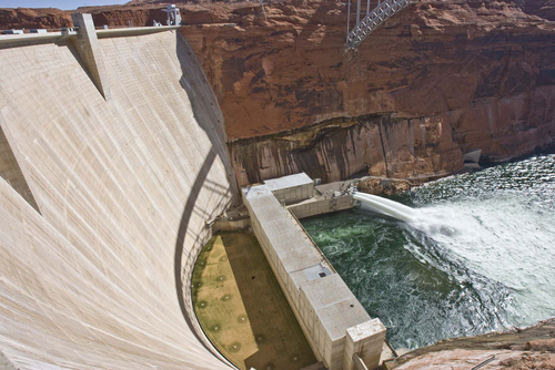 Tribune file photo
Valves at the base of the Glen Canyon Dam are opened for a test flood of the Grand Canyon in 2008. A new Interior Department order will make these releases more common, benefitting fish and recreation.