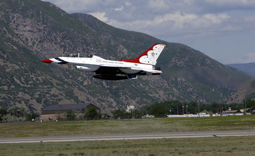 Francisco Kjolseth  |  The Salt Lake Tribune
Police officer Shawn Grogan of the Weber-Morgan Narcotics Strike Force, takes off in a Thunderbird F-16 with pilot Lt. Col. Jason Koltes as part of the Thunderbirds' Hometown Hero Program on Thursday, May 24, 2012, out of Hill Air Force Base. Grogan was one of the officers injured in a raid in January that killed a fellow officer.