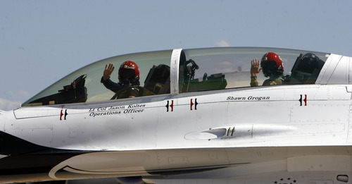 Francisco Kjolseth  |  The Salt Lake Tribune
Police officer Shawn Grogan, right, of the Weber-Morgan Narcotics Strike Force, gets ready to fly in a Thunderbird F-16 with pilot Lt. Col. Jason Koltes as part of the Thunderbirds' Hometown Hero Program on Thursday, May 24, 2012, out of Hill Air Force Base. Grogan was one of the officers injured in a raid in January that killed a fellow officer.