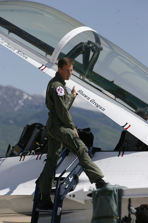 Francisco Kjolseth  |  The Salt Lake Tribune
Police officer Shawn Grogan of the Weber-Morgan Narcotics Strike Force, poses by his name as he gets ready to fly in a Thunderbird F-16 with pilot Lt. Col. Jason Koltes as part of the Thunderbirds' Hometown Hero Program on Thursday, May 24, 2012, out of Hill Air Force Base. Grogan was one of the officers injured in a raid in January that killed a fellow officer.
