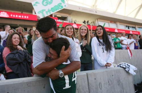 Kim Raff | The Salt Lake Tribune
Olympus player Tyler Ford hugs his father Kevin Ford after defeating  Murray 3-2 during the 4A State Championship game at Rio Tinto Stadium in Sandy, Utah on May 24, 2012.