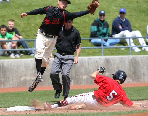 Steve Griffin/The Salt Lake Tribune


Alta's Colton Nash slides under American Fork's Jeremy Reynolds after hitting a triple during their 5A playoff game at Kearns High School in Kearns, Utah Thursday May 24, 2012.