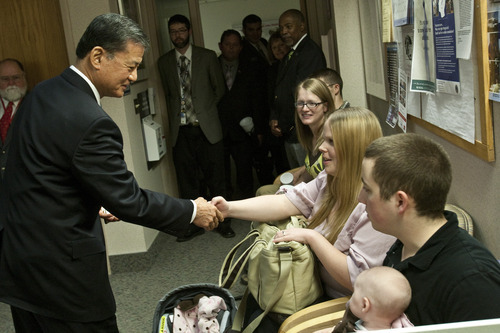 Chris Detrick  |  The Salt Lake Tribune
Secretary of Veterans Affairs Eric K. Shinseki greets Tammy and Caleb New, and their baby daughter Alicia, at the Women Veterans Clinic in the George E. Wahlen VA Medical Center in March. Tammy New was the first female Utah veteran to receive all her maternity care at the VA medical center in Salt Lake City.