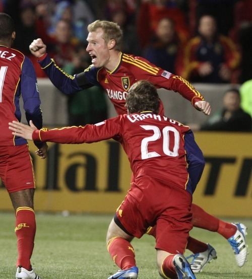Rick Egan  | The Salt Lake Tribune 

Nat Borchers (6) celebrates with Real Salt Lake midfielder Ned Grabavoy (20) after scoring the game winning goal, to give Real Salt Lake a 3-2 win over FC Fallas, in MLS soccer action, Real Salt Lake vs FC Dallas, in Sandy, Saturday, May 26, 2012.