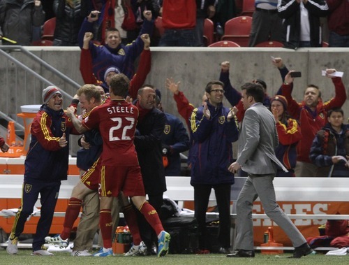 Rick Egan  | The Salt Lake Tribune 

Nat Borchers celebrates with his team after scoring the game winning goal, to give Real Salt Lake a 3-2 win over FC Fallas, in MLS soccer action, Real Salt Lake vs FC Dallas, in Sandy, Saturday, May 26, 2012.