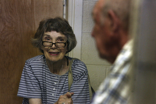 Scott Sommerdorf  |  The Salt Lake Tribune             
Lue Baadsgaard, a regular customer has written David Parry's story. She visits with him in his store, Monday, May 21, 2012. David Parry served in Europe during World War II, and is still active in his business, Parry Office Supply & Machines in Holladay. He's still at work at age 88.