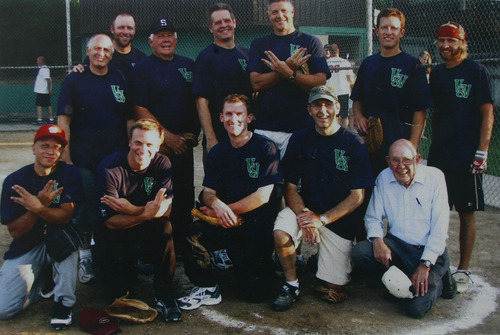 Scott Sommerdorf  |  The Salt Lake Tribune             
David Parry, lower right, with the softball team he coached, in one of his personal photos. He served in Europe during World War II, and is still active in his business, Parry Office Supply & Machines in Holladay. He's still at work at age 88. Lue Baadsgaard, a regular customer has written his story.