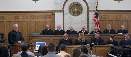 Al Hartmann  |  The Salt Lake Tribune 
U.S. District Court Judge David Nuffer speaks to the audience at the Frank Moss Federal Courthouse in Salt Lake City on Tuesday after his swearing in. To his right are other federal judges in the 
District of Utah.