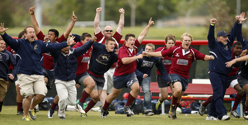 Trent Nelson  |  The Salt Lake Tribune
Herriman players rush the field to celebrate as Herriman defeated Trybe for the Division 1 state rugby championship Saturday, May 26, 2012 at the University of Utah in Salt Lake City, Utah.