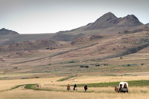 Rick Egan  | The Salt Lake Tribune 
A wagon train rolls along a trail on Antelope Island during the 7th annual Cowboy Legends, Cowboy Poetry & Music Festival on Sunday.