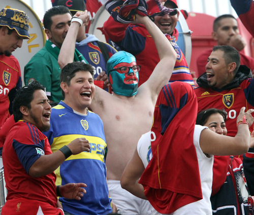 Rick Egan  | The Salt Lake Tribune 

Real Salt Lake fans cheer during MLS soccer action, Real Salt Lake vs FC Dallas, in Sandy, Saturday, May 26, 2012.