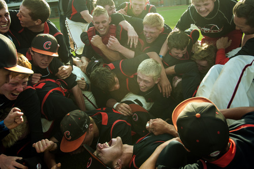 Chris Detrick  |  The Salt Lake Tribune
Members of the American Fork baseball team celebrate after winning the 5A championship game at Kearns High School Friday May 25, 2012. American Fork won the game 5-4.