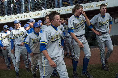 Chris Detrick  |  The Salt Lake Tribune
Members of the Taylorsville baseball team walk off of the field after the 5A championship game at Kearns High School Friday May 25, 2012.  American Fork won the game 5-4.