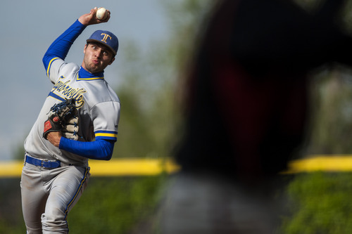 Chris Detrick  |  The Salt Lake Tribune
Taylorsville's Hayden Heugly (19) pitches during the 5A championship game at Kearns High School Friday May 25, 2012.  American Fork won the game 5-4.