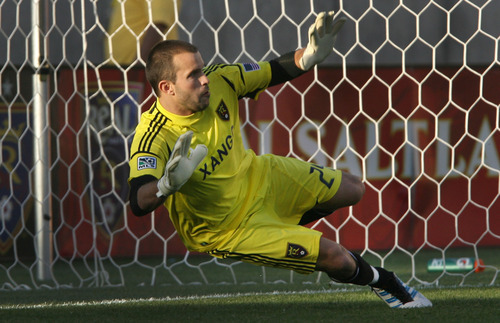 Steve Griffin | The Salt Lake Tribune 
Real Salt Lake goal keeper Kyle Reynish dives for the ball during a Minnesota penalty kick during first-half action at Rio Tinto Stadium in Sandy on May, 29, 2012. Reynish was unable to stop the shot.