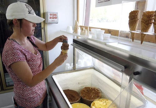 Rick Egan  | The Salt Lake Tribune 

Marisha Spencer dishes up ice cream at Reed's Drive Inn in Nephi.