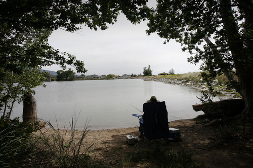 Rick Egan | The Salt Lake Tribune
Dave Butler does some fishing at Andy Adams Reservoir in Layton.  Layton City in partnership with Kays Creek Irrigation Company and the Division of Wildlife Resources are planning a grand opening of the Andy Adams Community Fishery at Andy Adams Reservoir, June 2, in Layton.