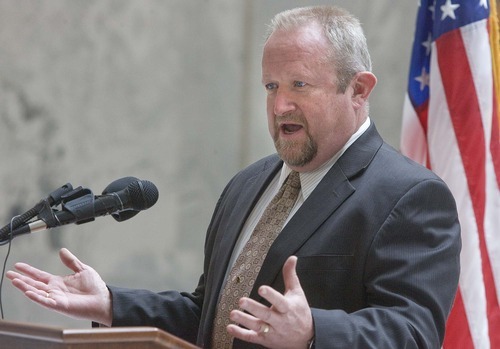 Paul Fraughton  |  The Salt Lake Tribune.Taylorsville Mayor Russ Wall talks about the impact of foreclosures on his community as he speaks  at a  press conference in the capitol rotunda  sponsored by The Utah Foreclosure Crisis Coalition on Wednesday  April 20, 2011