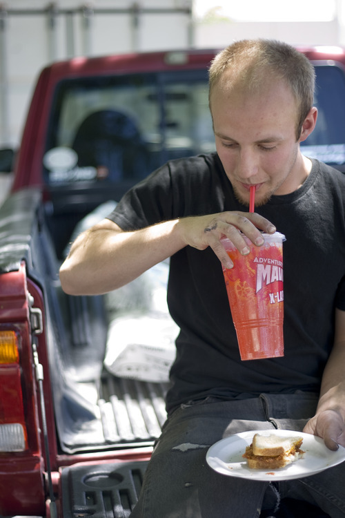 Kim Raff | The Salt Lake Tribune
K.C. Quilter takes a sip of his fountain drink from Maverick while talking  about New York's drink bans outside of a Maverick gas station in Salt Lake City, Utah on May 31, 2012.