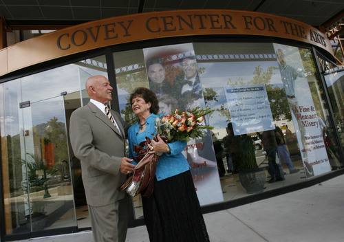 Stephen and Sandra Covey gather at the front of the newly named Covey Center for the Arts. Provo City officials announce the naming rights to the arts center along Center Street at the site that used to be the city library as the Covey Center for the Arts on Thursday named for Sandra M. Covey, a member and former Chair of the Provo Arts Council.    Photo by Francisco Kjolseth/The Salt Lake Tribune 8/23/2007